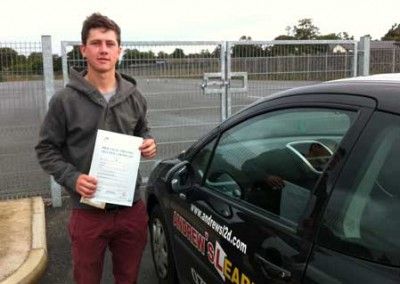 evan pleased that he has passed driving test