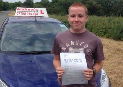 Colwyn Bay driving lessons Alex holding his pass certificate