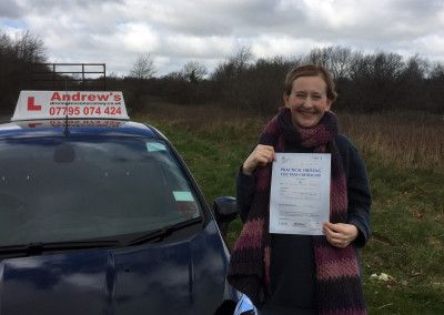 Ela with her driving test Pass Cetificate