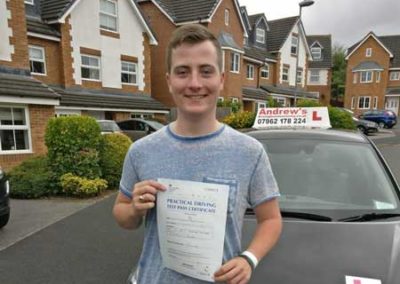 Edward with driving test pass certificate