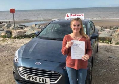 Brooke in Abergele with driving test certificate.