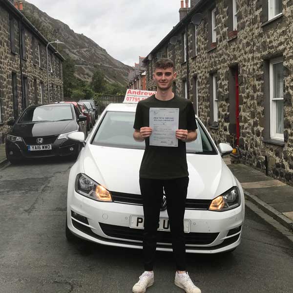Luke after his driving lessons in Penmaenmawr.