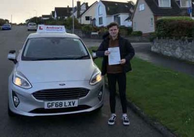Bailey in Deganwy with the driving school car.