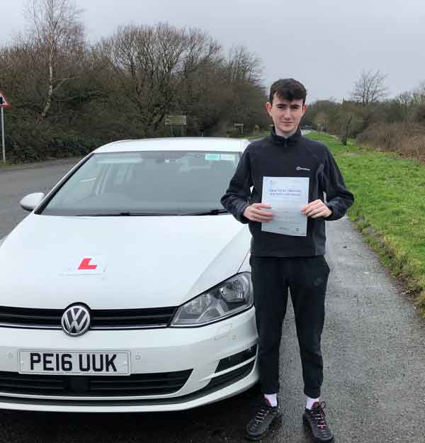 Osian with his driving test certificate.