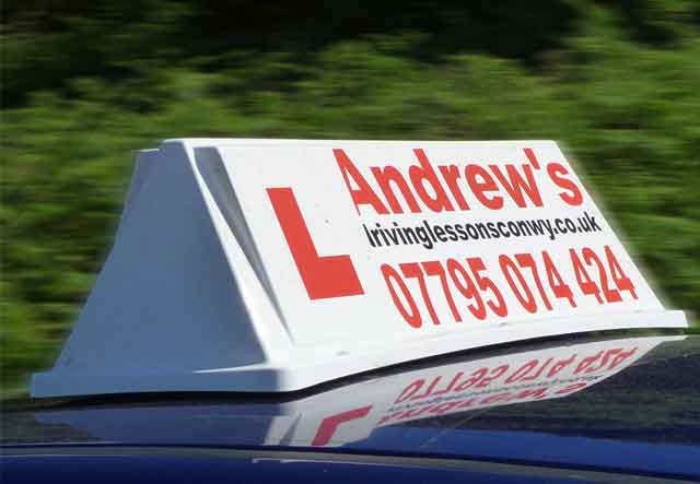 Andrew's Driving School car roof sign