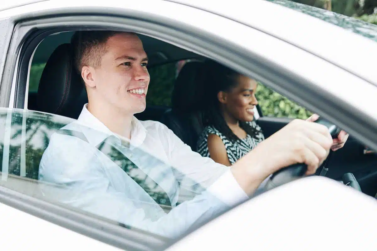 A young man happy on his driving lesson