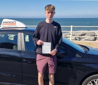 Elliot with his driving test pass