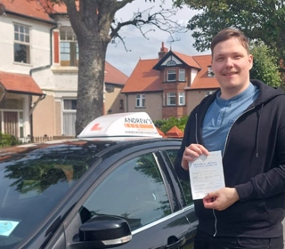 George in Caernarfon after a driving test