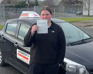 A newly passed learner with pass certificate