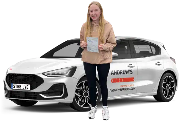 Driving lessons Llandudno: Chana from Llandudno Junction holding her pass certificate after passing in Bangor beside Andrew’s Driving School car