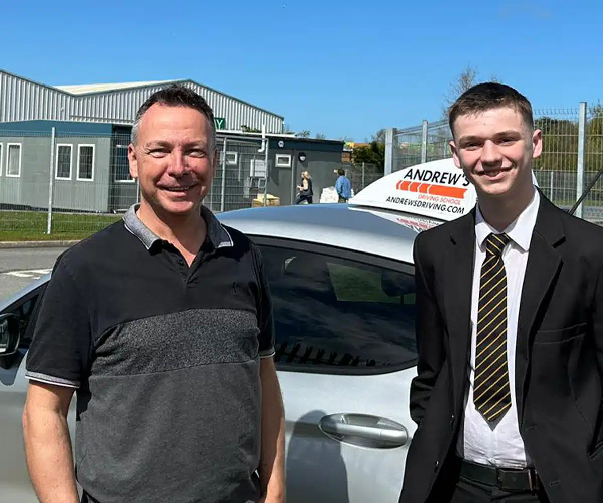 Chris outside Bangor Driving Test Centre with his pupil after passing his part 3