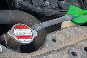 Toyota Yaris Hybrid coolant filler location inside the engine bay