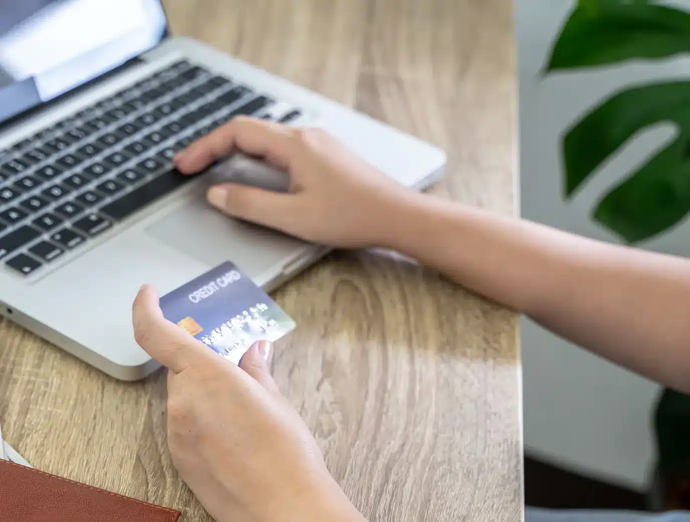 Learner driver booking a driving test on a laptop