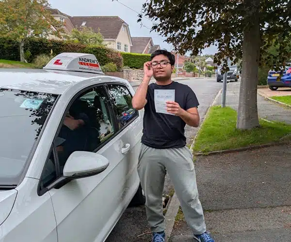 Abdul from Colwyn Bay holding his driving test pass certificate