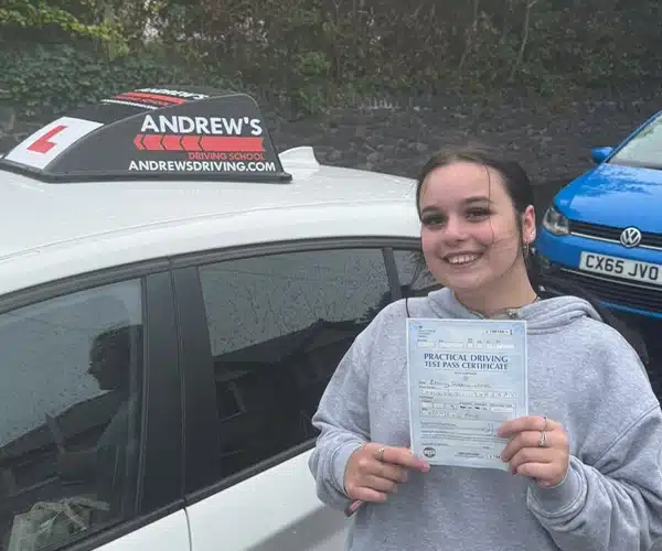 Ebony Jones with her driving test pass certificate at Bangor Driving Test Centre