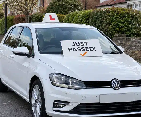 Andys Driving Tuition car in Chester with lukes Just Passed board on the windscreen