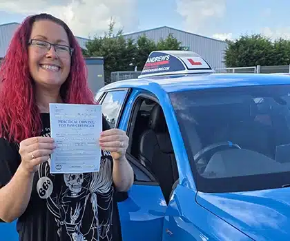 Ria in Bangor driving Test Centre after learning to drive with Ryan in Conwy
