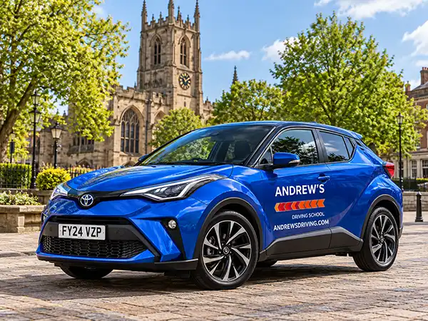 Illustrative image of an Andrew’s Driving School automatic tuition car with Derby Cathedral in the background