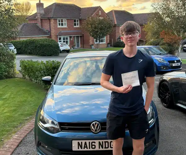 Louis Bruce from Old Colwyn after passing his driving test in Rhyl following lessons with Ben Vaughan-Jones.