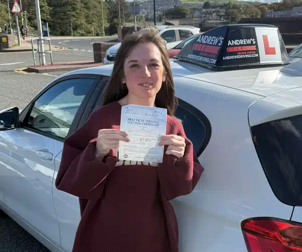 Zoe Mcabe from Llandudno Junction after passing her driving test in Rhyl following lessons with Ben Vaughan-Jones.